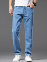 Men’s straight-leg jeans in light-wash blue denim with a classic five-pocket design and straight-leg cut