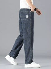 Men’s dark-wash denim straight leg jeans with a straight leg cut and small white label on the back pocket visible