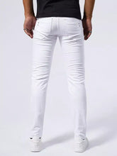 Back side of men’s white slim-fit straight leg jeans with subtle stitching and metallic rivets on denim back pockets