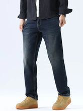 Dark-wash men’s straight leg washed jeans with subtle fading and contrast stitching in denim fabric
