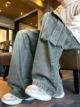Men’s vintage wash wide leg cargo jeans in gray green with loose fit and large pocket design