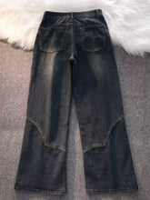 Men’s vintage wash wide leg jeans in dark-wash denim with flared legs and reinforced knee patches