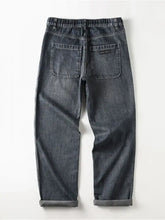 Dark gray denim men’s vintage wash wide leg jeans with elastic waistband and rolled cuffs in vintage wash wide style