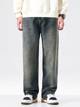 Men’s vintage wash wide-leg jeans in dark-wash denim with a relaxed straight-leg cut and subtle thigh fading