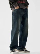 Men’s dark-wash denim vintage wash wide leg jeans with relaxed straight cut and visible seam stitching