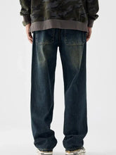 Men’s vintage wash wide leg dark-wash denim jeans with a relaxed straight-leg cut and classic back pockets view of back side