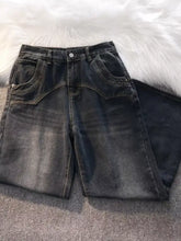 Dark-wash denim shorts with high waist and classic five-pocket design complement men’s vintage wash wide leg jeans
