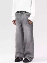 Men’s vintage wash wide leg gray denim jeans with faded finish and visible stitching details