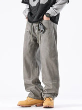 Men’s vintage wash wide leg jeans in relaxed fit gray green with multiple pockets and adjustable drawstring design