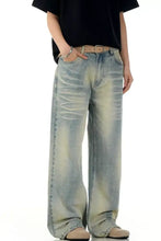 Men’s vintage wash wide leg jeans in light-wash denim with relaxed fit and subtle fading for a vintage look