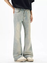 Men’s wash flare jeans in light-wash denim featuring a relaxed vintage-inspired fit and flare jeans style