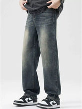 Men’s dark-wash denim loose fit jeans with a faded, distressed look and straight-leg cut fit jeans