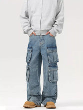 Men’s light-wash denim cargo jeans featuring multiple large pockets and a relaxed wide-leg fit wash multi-pocket design