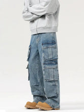 Men’s light-wash denim cargo jeans with a relaxed wide-leg cut and multiple large wash multi-pocket details