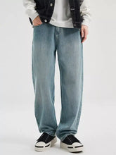 Men’s wash relaxed fit jeans in light-wash denim with a relaxed, straight-leg cut designed for comfort and style