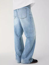 Men’s wash relaxed fit wide leg jeans in light-wash denim with a straight-cut silhouette and subtle fading for a contemporary look