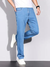 Men’s wash slim fit light blue denim jeans with straight-leg cut and classic five-pocket design