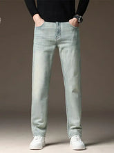Men’s wash straight fit casual jeans in light-wash denim with a straight-leg cut and classic five-pocket design