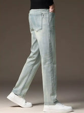 Men’s light-wash denim jeans with a straight fit and subtle fading ideal for casual wear in a wash straight fit style
