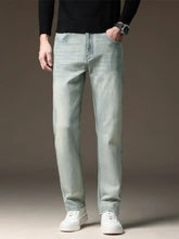 Men’s wash straight fit casual jeans in light-wash denim with straight fit cut and subtle fading