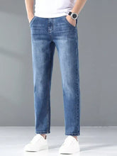 Men’s wash straight leg jeans in blue denim with a straight-leg cut and subtle fading on front side