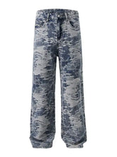 Men’s wash wide leg denim jeans with a faded blue and gray tie-dye pattern and a relaxed wide leg fit