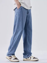 Men’s light-wash blue denim jeans with a relaxed straight-leg cut in a wide leg style