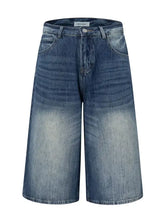 Mens washed denim Bermuda shorts with wide-leg cut and distressed detailing