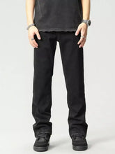 Men’s black straight-leg denim washed loose fit jeans with a slightly worn finish and frayed cuffs