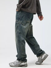Men’s dark-wash denim relaxed fit jeans with cargo pockets and reinforced stitching for durability and style