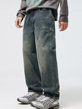Men’s dark-wash denim cargo pants with a relaxed fit and visible stitching details in relaxed fit jeans style