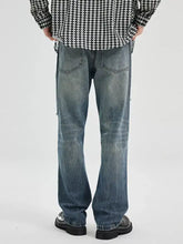 Men’s washed ripped bootcut jeans in blue denim with a faded distressed look and classic five-pocket design