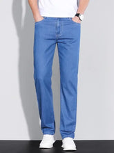 Men’s washed straight fit blue denim jeans with straight-leg cut and classic stitching in washed straight style