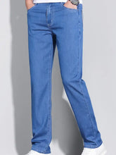 Men’s blue denim jeans with classic stitching and a washed straight fit straight leg cut