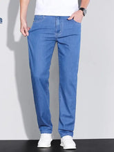 Men’s blue denim washed straight fit jeans with straight-leg cut and classic five-pocket design