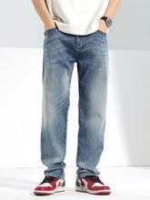 Men’s washed straight jeans in light-wash denim with a relaxed straight-leg cut and subtle fading for a modern look