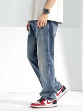 Men’s light-wash blue denim washed straight jeans with a relaxed straight-leg cut for casual wear