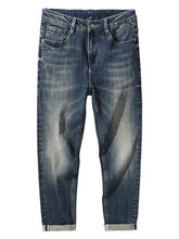 Men’s dark-wash denim washed straight leg jeans with faded distressed details and rolled cuffs