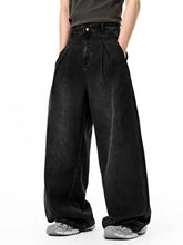 Men’s washed wide leg jeans in black denim with a relaxed high-waisted fit and subtle fading for modern streetwear