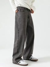 Men’s washed wide leg jeans in dark gray denim with a relaxed straight-cut silhouette for casual wear