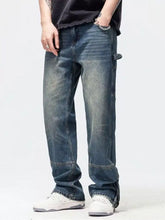 Men’s washed denim wide leg jeans in dark wash with relaxed straight-leg cut and visible stitching details