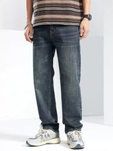 Men’s washed wide leg dark-wash denim jeans with a straight-leg cut and subtle fading in cotton material