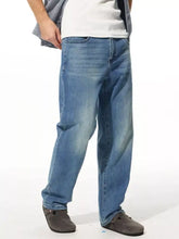 Men’s washed wide leg jeans in light-wash blue denim with a relaxed straight-leg cut for comfortable wear