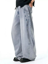 Men’s light-wash denim wide leg jeans with a relaxed oversized fit perfect for casual wear