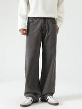 Men’s washed wide leg jeans in dark gray denim with a relaxed fit and classic five-pocket design