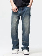 Men’s washed denim wide leg jeans in blue with straight-leg cut and reinforced stitching for durability