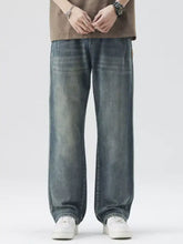 Dark-wash denim men’s washed wide leg relaxed fit jeans with subtle fading for a casual, modern look