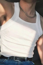 Men’s white ribbed wide strap tank with square neck, black belt, blue jeans