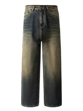 Men’s wide leg baggy jeans in dark-wash denim with a faded, distressed look and a relaxed fit