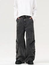 Men’s wide-leg cargo jeans in dark gray cotton denim with multiple large pockets and distressed texture